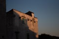 Sun covering half of a residential building in Sibenik, Croatia Royalty Free Stock Photo