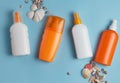 Sun cream, cream, sunscreen bottle, sun cream, lotion bottle, seashells. Beach flat lay accessories.