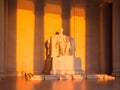 Sun at dawn illuminates Lincoln statue