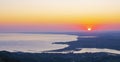 The sun at dawn over the cities of Irun and Hondarribia Royalty Free Stock Photo