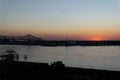 Sun dipping below the horizon along the Mississippi River in Baton Rouge