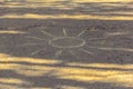 Sun drawn in chalk on an asphalt outdoors Royalty Free Stock Photo