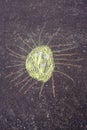 Sun drawn in chalk on asphalt outdoors Royalty Free Stock Photo