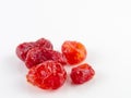 Sun-dried cocktail tomatoes on white background