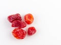 Sun-dried cocktail tomatoes on white background