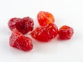 Sun-dried cocktail tomatoes on white background