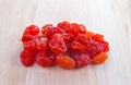 Sun-dried cocktail tomatoes on a wood background