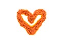 Sun-Dried Tomato Pesto in a heart shape isolated on white Royalty Free Stock Photo
