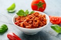 Sun dried tomato pesto in white bowl