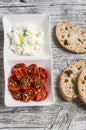 Sun-dried tomatoes, goat cheese and ciabatta bread Royalty Free Stock Photo