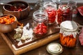 Sun dried tomatoes with herbs and sea salt in olive oil in a glass jar Royalty Free Stock Photo