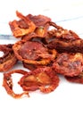 Sun dried tomatoes isolated on white background Royalty Free Stock Photo