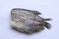 Sun dried uncooked Gourami fish - In Thai called Pla Salit isolated on white background