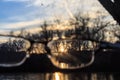 Sun through eyegalsses during sunset. Royalty Free Stock Photo