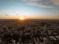 Sun falling dawn in the city. Aerial drone view at sunset