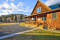 Nice wooden ranch home with beautiful landscape in the countryside. Royalty Free Stock Photo