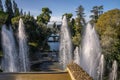 Sun flare in the spray of the fountain of Villa d