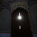 The sun through the gate of the Bibi Khanym Mosque, Samarkand, Uzbekistan Royalty Free Stock Photo