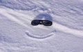 Sun glasses on snow Royalty Free Stock Photo