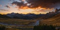 Sun glow in evening hazy sky. Mountain panoramic peaceful view from Giau Pass