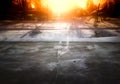 Sun glow over empty winter railway station background Royalty Free Stock Photo