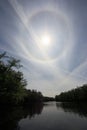 Sun halo above Fisheating Creek, Florida. Royalty Free Stock Photo