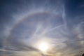 Sun halo in blue sky on bright winter day Royalty Free Stock Photo