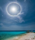 Sun Halo over the sea and beach