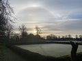 Sun halo seen on frosty morning at priory park Royalty Free Stock Photo