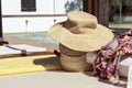 Sun hat, beach bag and pareo on balinese bed Royalty Free Stock Photo