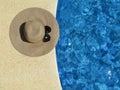 Sun Hat and Shades by the pool Royalty Free Stock Photo