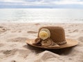 Sun hat woman on sand beach