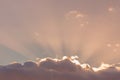 Sun hidden behind the cloud at sunset Royalty Free Stock Photo