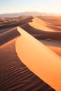 Sun-kissed sand dunes with soft shadows at dusk Royalty Free Stock Photo