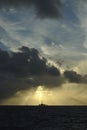 Sun light beams over Oil platform Royalty Free Stock Photo