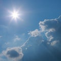 Sun light through cloud on clear blue sky background Royalty Free Stock Photo