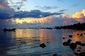 Colorful sunrise with reflection on water. Morro Sao Paulo, Bahia, Brazil Royalty Free Stock Photo