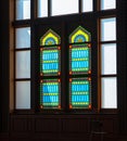 Sun light coming through the colorful stained glass window of a mosque Royalty Free Stock Photo