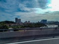 Sun light highway multiple lanes car traffic jam evening kuala lumpur airport drive travel commute to city malaysia asia Royalty Free Stock Photo