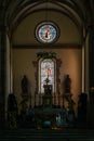 Sun light through the leaded pane in old majestic church