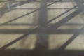 The sun light shine in empty room passed through glass window and make shadow on the floor Royalty Free Stock Photo