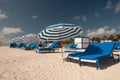 Sun loungers on beach Royalty Free Stock Photo