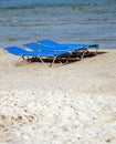 Sun loungers or beds on sandy beach