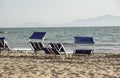 Sun loungers empty at seaside resort , the calm and relaxed atmosphere of the summer holiday at sunset