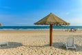 sun loungers and shelters on beach