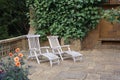 Sun loungers on stone patio Royalty Free Stock Photo