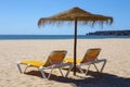 Sun Loungers and Umbrella on Beach Royalty Free Stock Photo