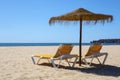 Sun Loungers and Umbrella on a Beach Royalty Free Stock Photo