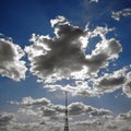 Sun obscured by clouds and antenna