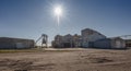 Sun over a Cotton Gin in Texas Royalty Free Stock Photo